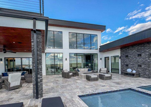 Modern Luxury Hill Top Outdoor Living Poolside Patio Glass Facade Zbranek and Holt Custom Homes