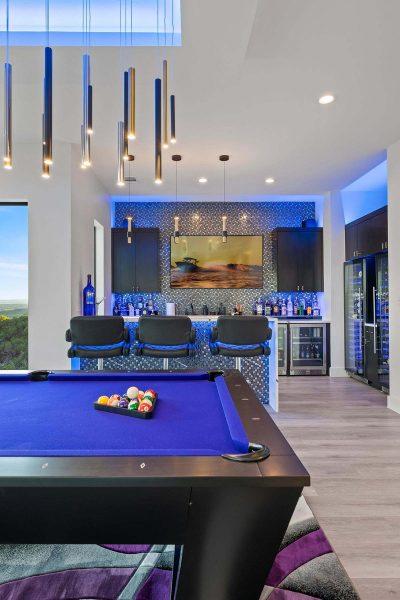 Modern Luxury Hill Top bar and game room mosaic tile backlit design Zbranek and Holt Custom Homes