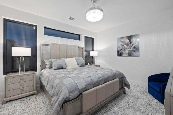 Modern Luxury Hill Top guest bedroom ceiling lighting horizontal windows Zbranek and Holt Custom Homes