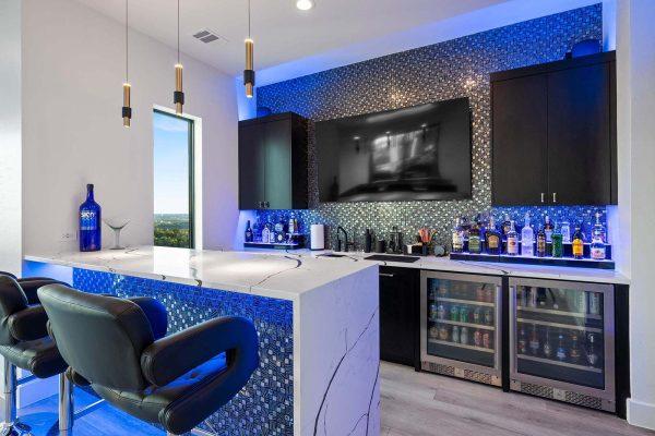 Modern Luxury Hill Top home bar marble countertop mosaic tile backdrop Zbranek and Holt Custom Homes