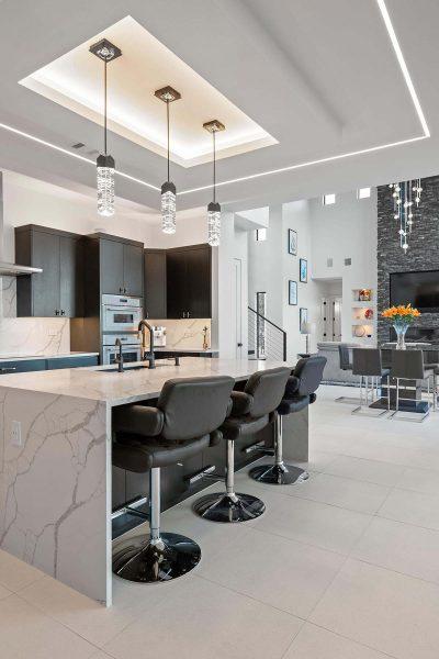 Modern Luxury Hill Top kitchen quartz island crystal light fixtures seating Zbranek and Holt Custom Homes