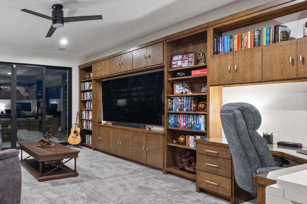 Modern Luxury Hill Top library built in entertainment unit desk space Zbranek and Holt Custom Homes